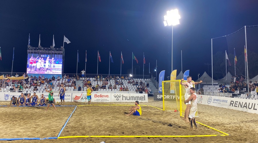 Croatia players celebrate beating hosts Greece in the semi-final of the 2022 IHF Men's Beach Handball World Championships