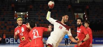 Last-minute save lifts Qatar past Japan