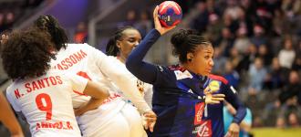 Olympic champions France squeeze past Angola
