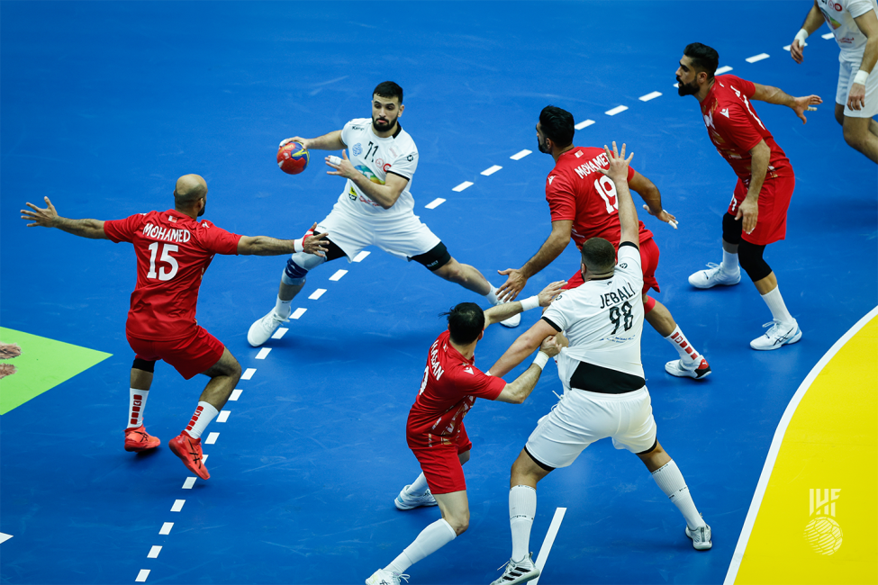 Moment from the match Bahrain vs Tunisia with Tunisia attacking