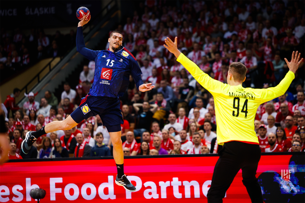 France player in the air while shooting