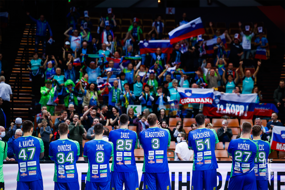Slovenia players celebrating with fans