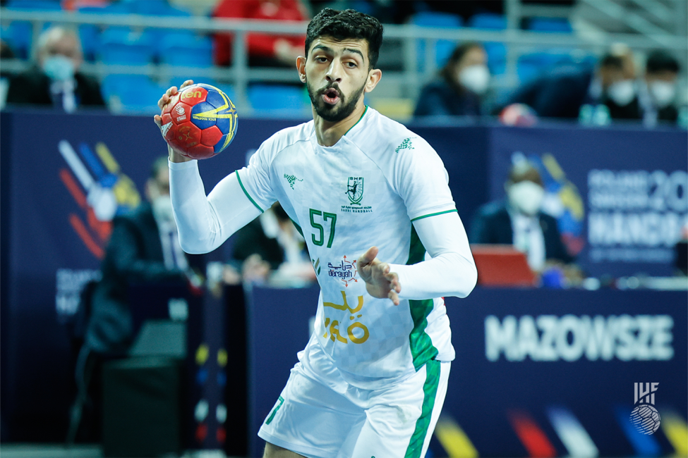Saudi Arabia player with the ball