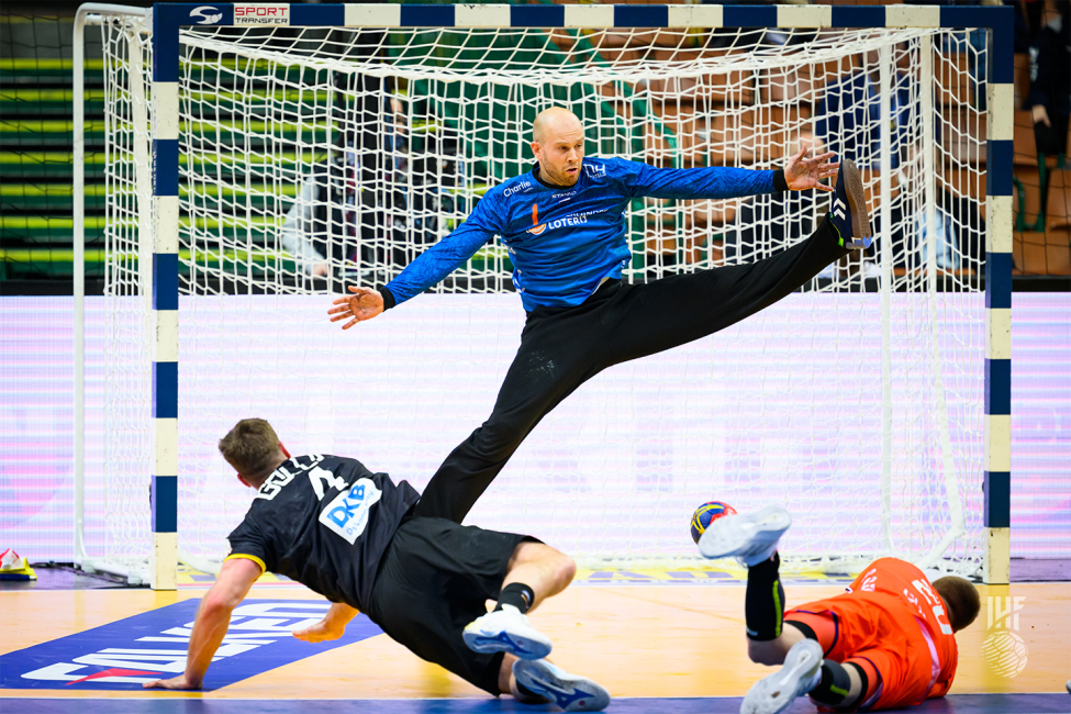 Netherlands goalkeeper trying to save a shot