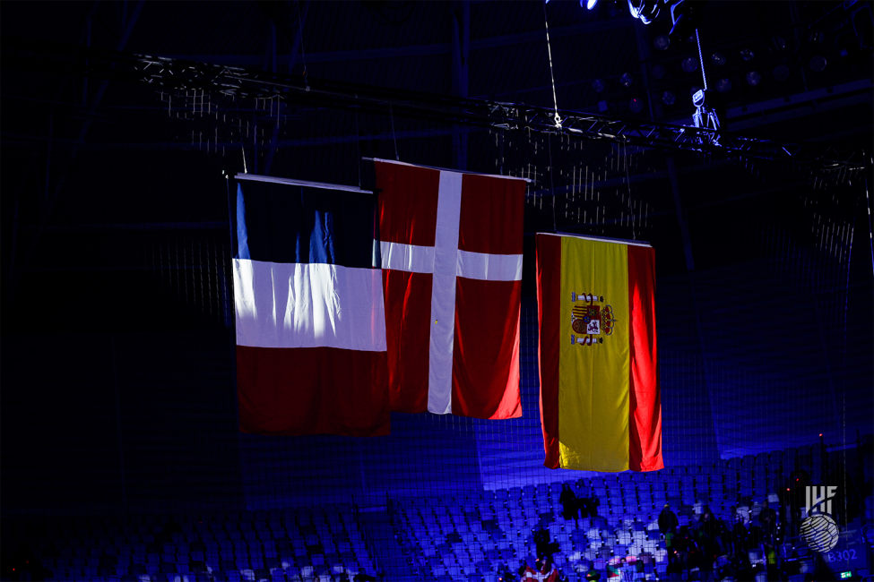 The flags of the three podium winners