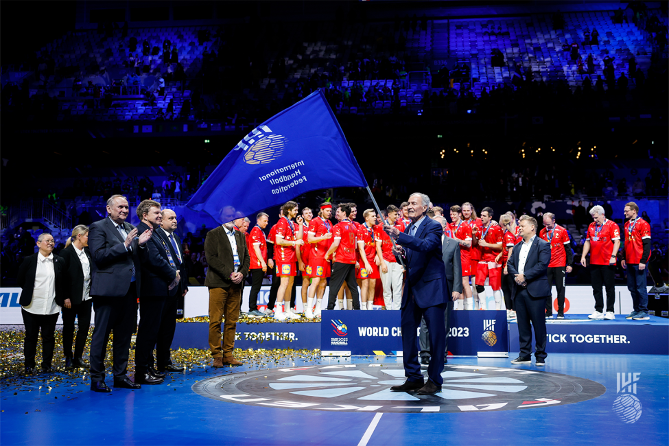 IHF President waving the IHF flag