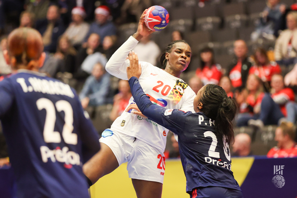 Angola player attacking 