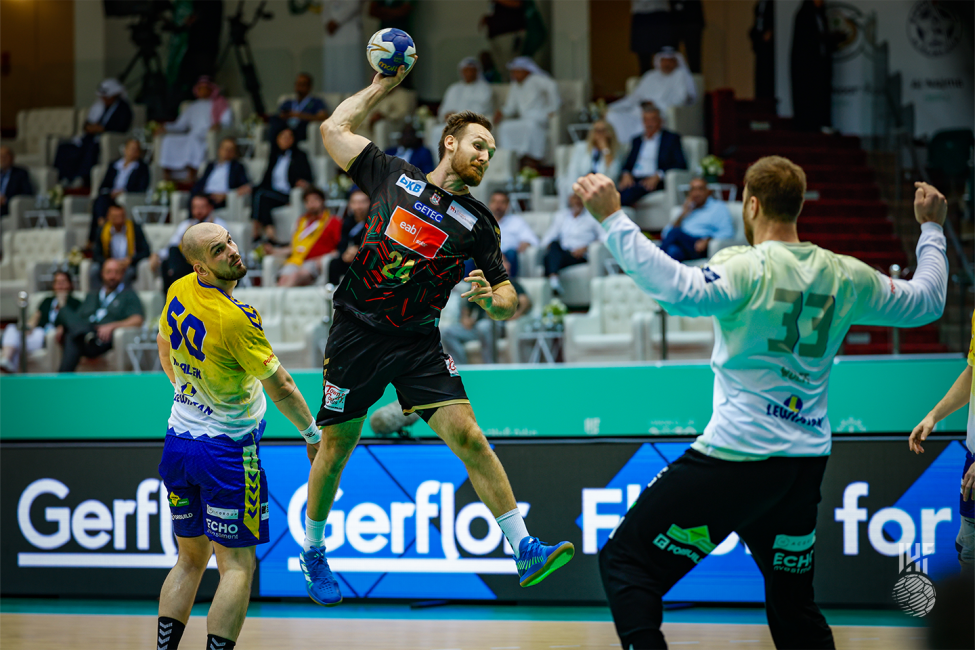 Magdeburg player shooting