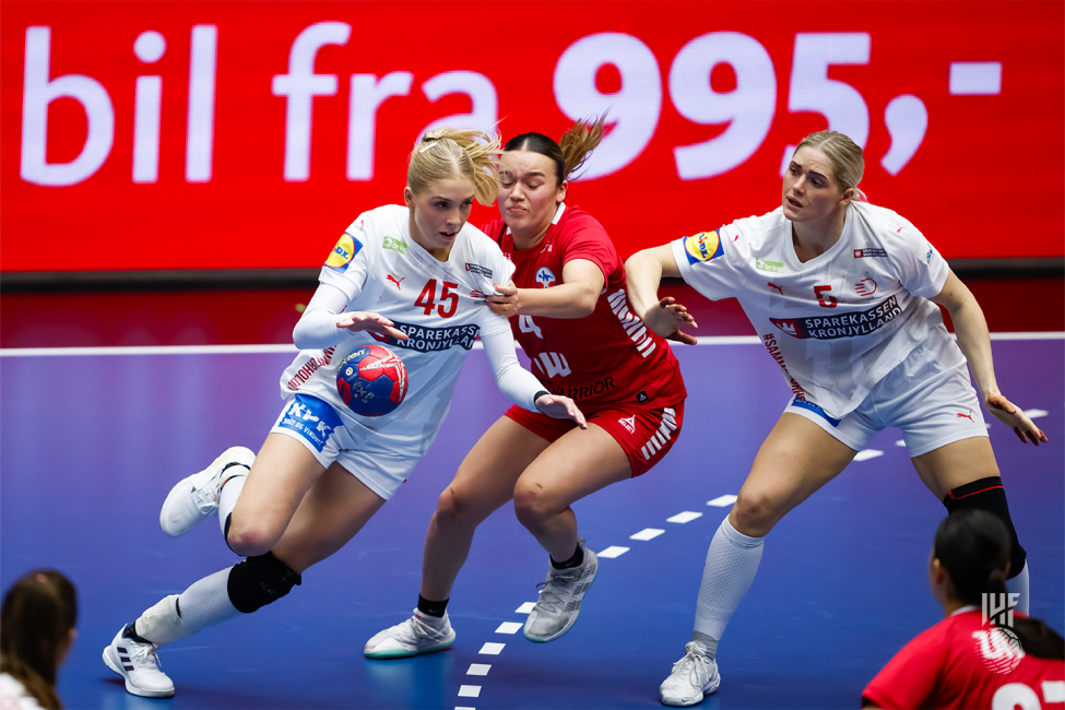 Denmark player dribbling in attack