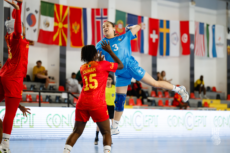 Uzbekistan player attacking
