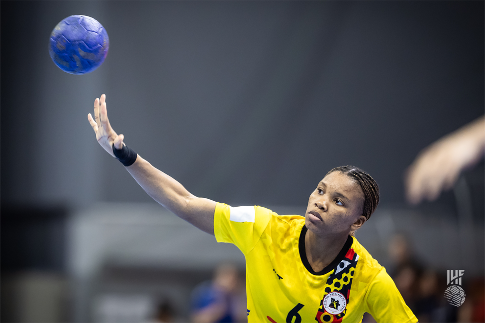 Angola player passing the ball