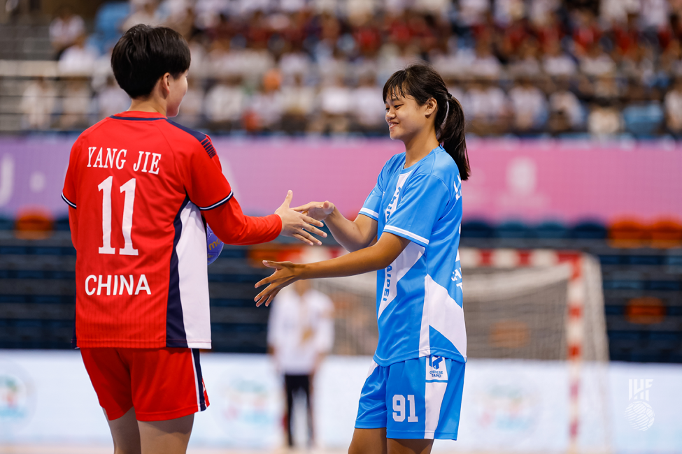 China and Chinese Taipei players greet each other