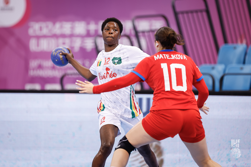 Guinea player attacking