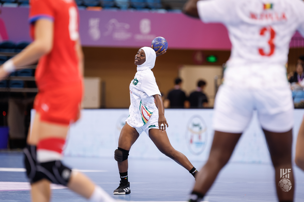 Guinea player attacking