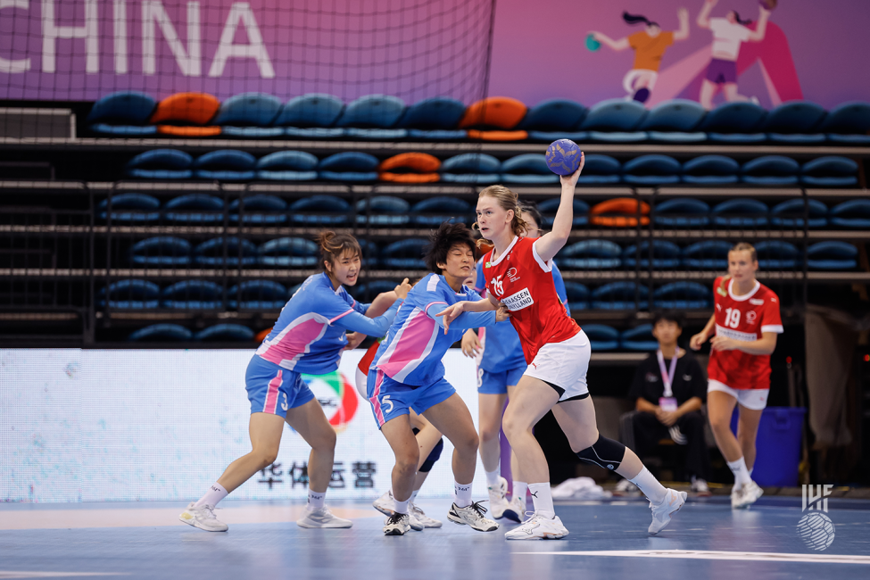 Denmark player attacking
