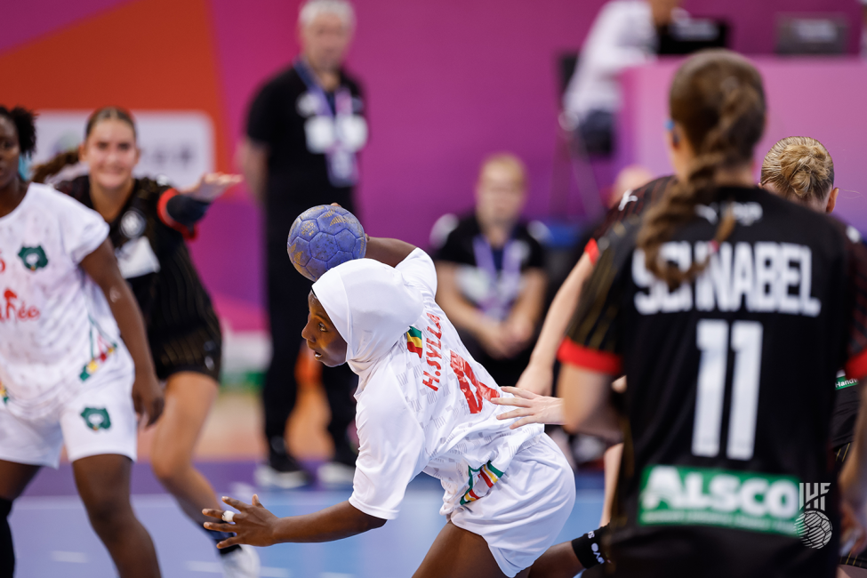 Guinea player attacking