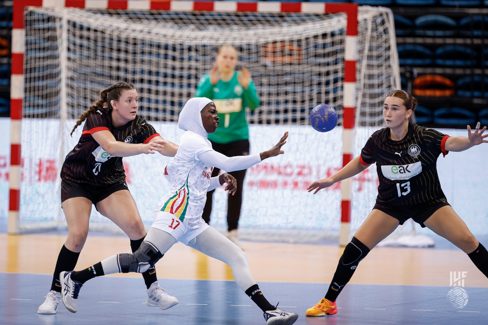 Guinea player attacking