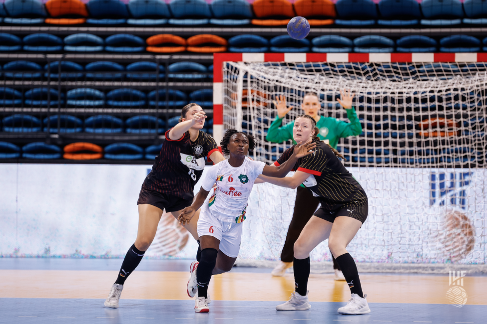 Guinea player attacking