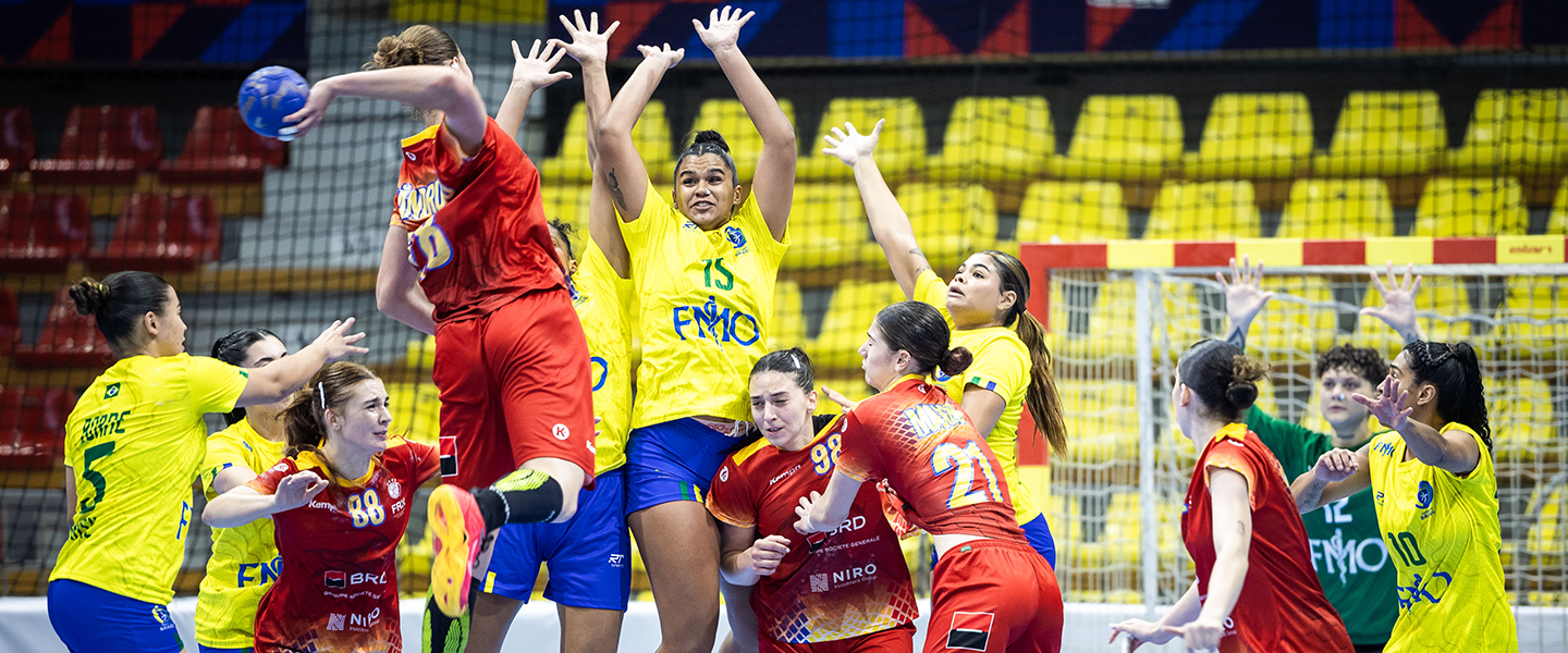 Romania claim hard-fought victory in opening game against Brazil