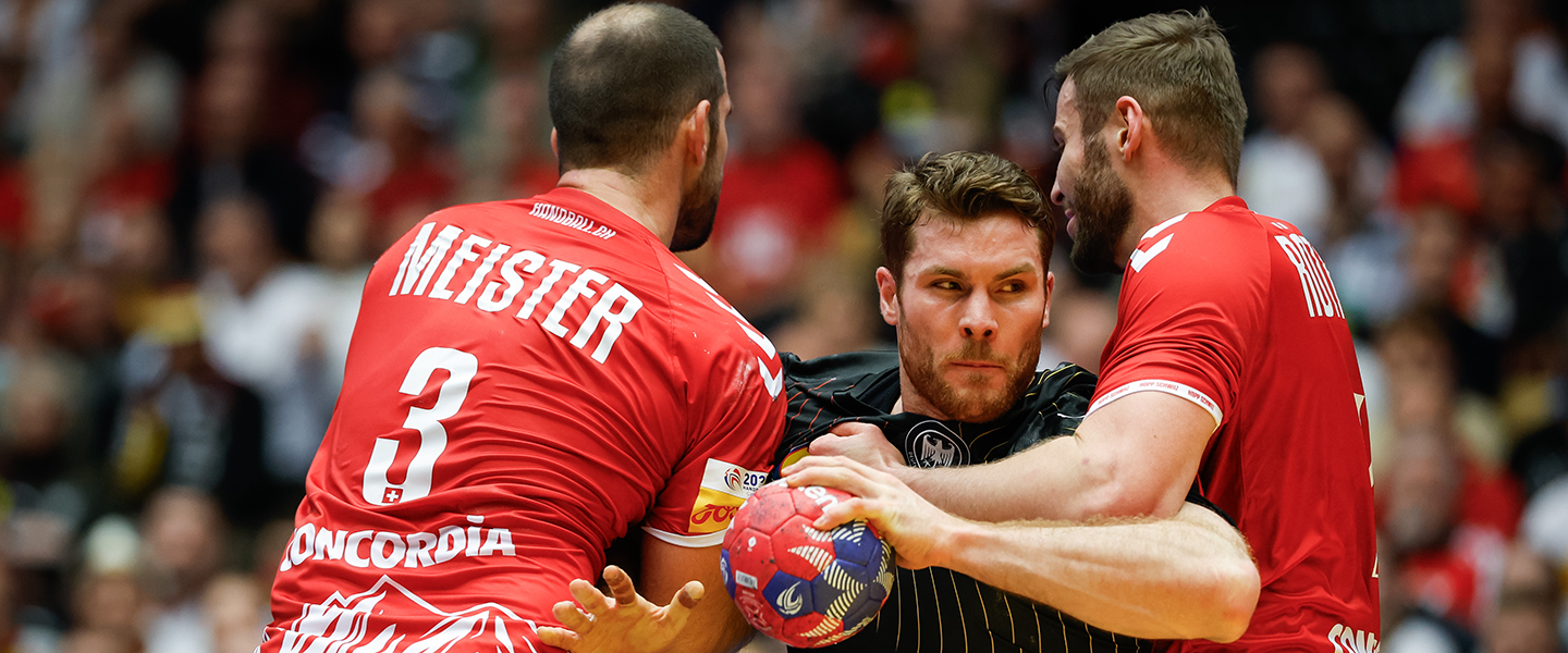 Germany sweat, but finally break Switzerland to seal main round spot